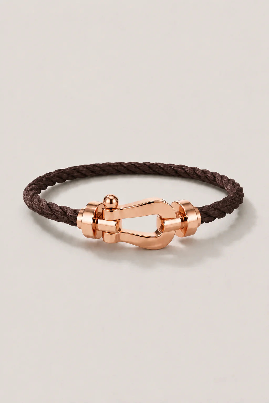 Le bracelet Riviera or rose marron foncé